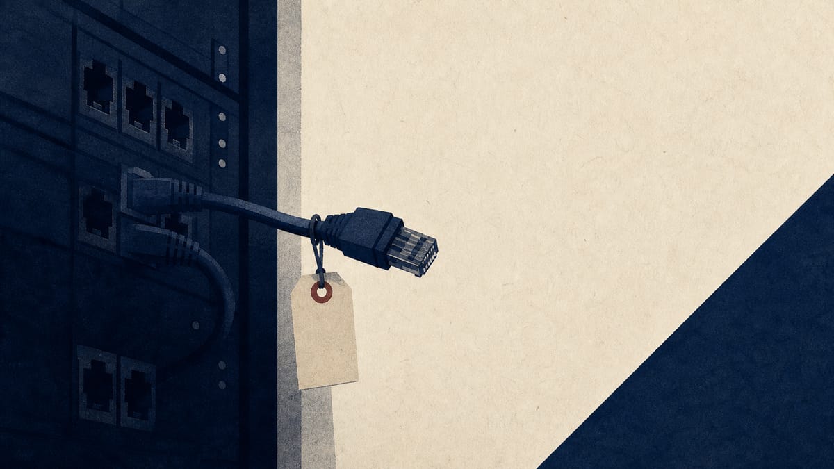 A server rack with one cable disconnected and tagged, illustrating a computer isolated after a law-enforcement cyber intervention.