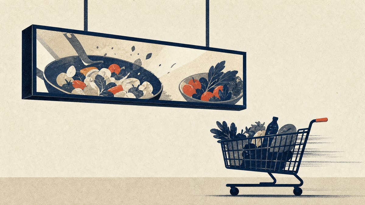 Digital signage screens mounted above supermarket shelves showing recipe video content, illustrating a retail media advertising network tied to a grocery aisle.